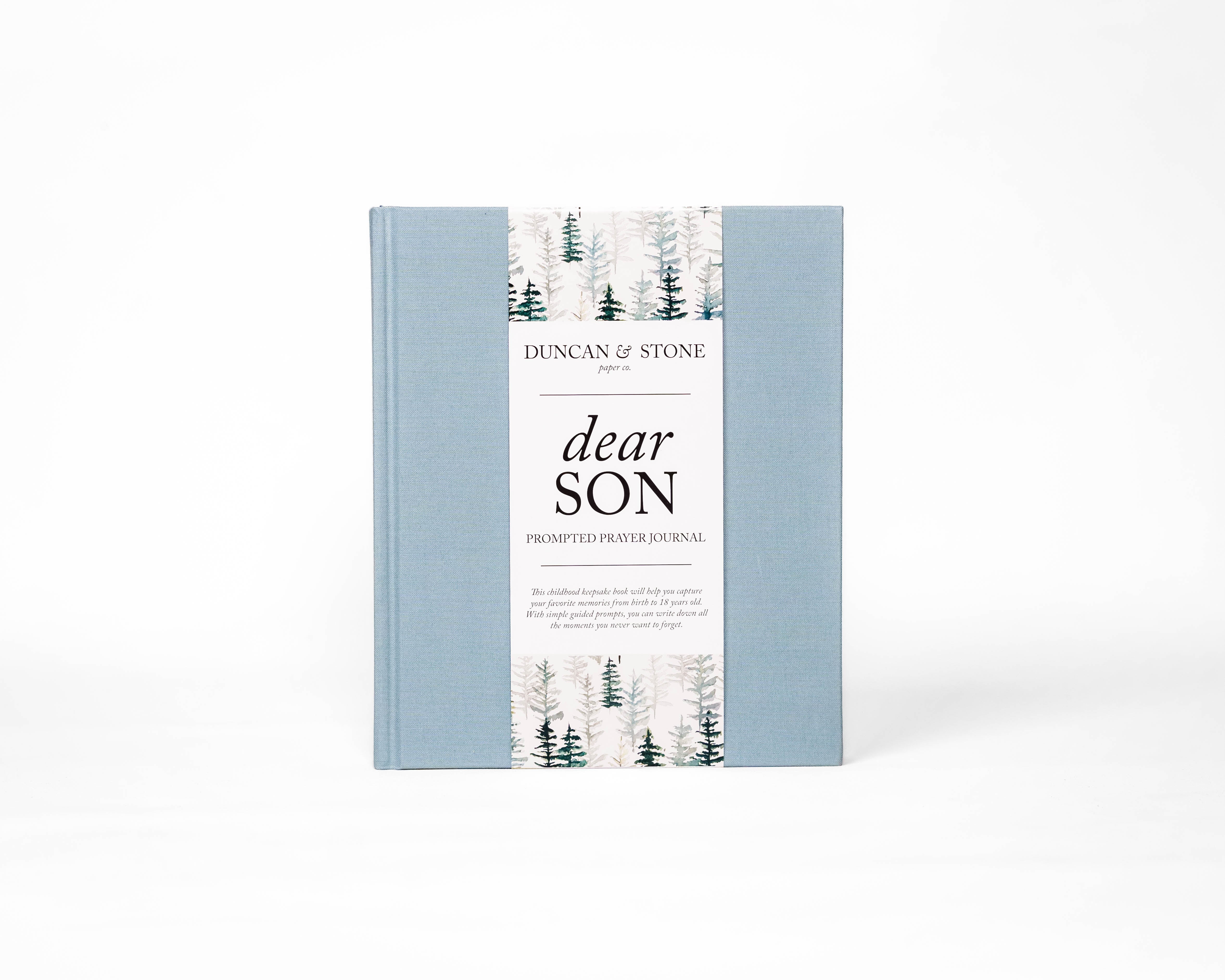 Book titled 'Dear Son' by Duncan & Stone with a forest design on the cover.