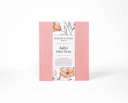 Book titled 'Baby's First Year' by Duncan & Stone with floral design on a white background