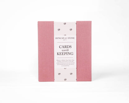 Pink card worth keeping holder with white label on a white background