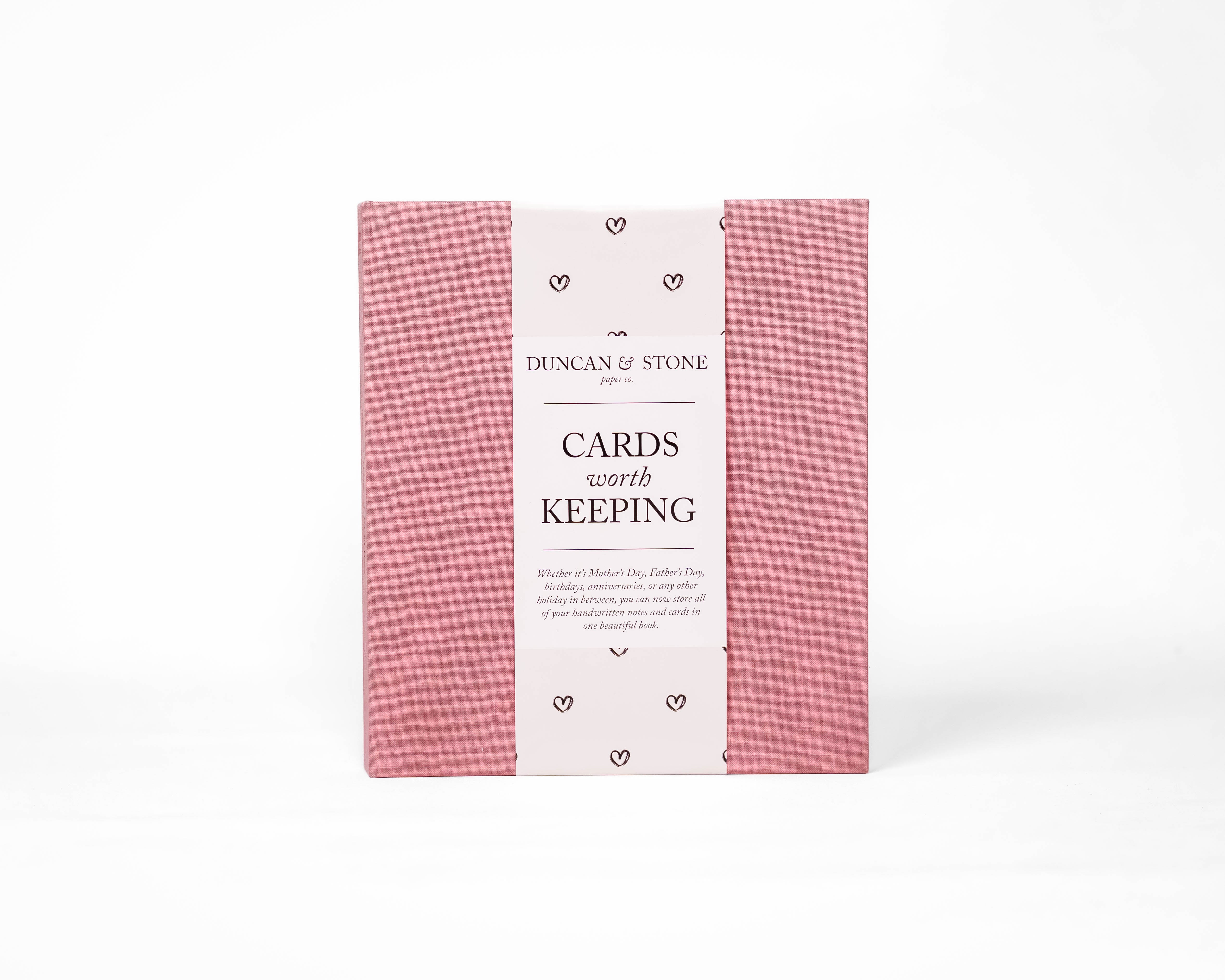 Pink card worth keeping holder with white label on a white background