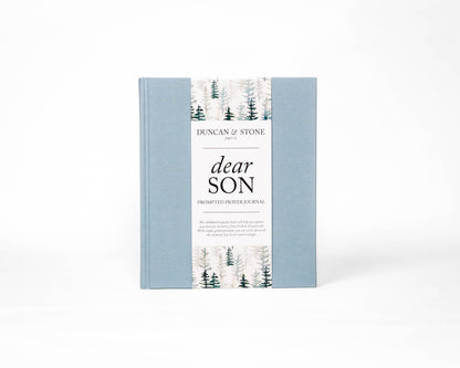 Book titled 'Dear Son' by Duncan & Stone with a forest design on the cover.